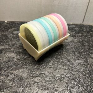 Vintage Tupperware Canister set in holder.  Set of 6. I think NWOT.